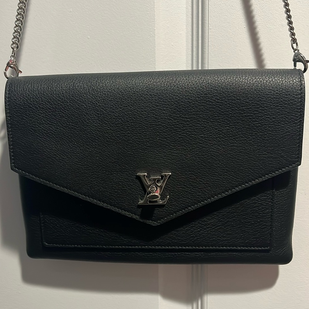 Authentic Louis Vuitton Lock Me bag